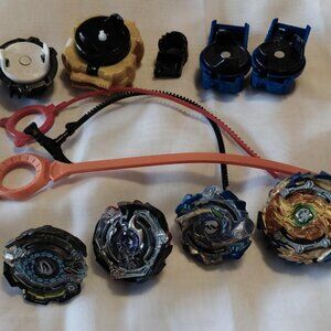 Lot of 4 Bey Blade Burst plus Launch Accessories